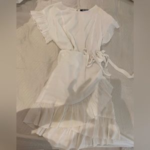 Small white linens wrap dress with ruffles